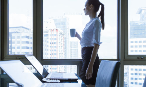 Business woman looking out the window